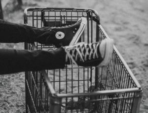 Converse sneakers in a shopping cart