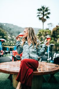 woman with 2 glasses of rosé